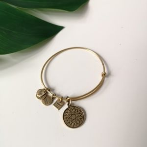 Alex and Ani gold tone sun charm bracelet